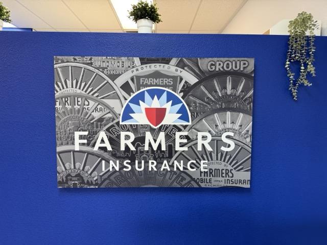 Farmers Insurance sign inside the Sandra Ortiz Agency office